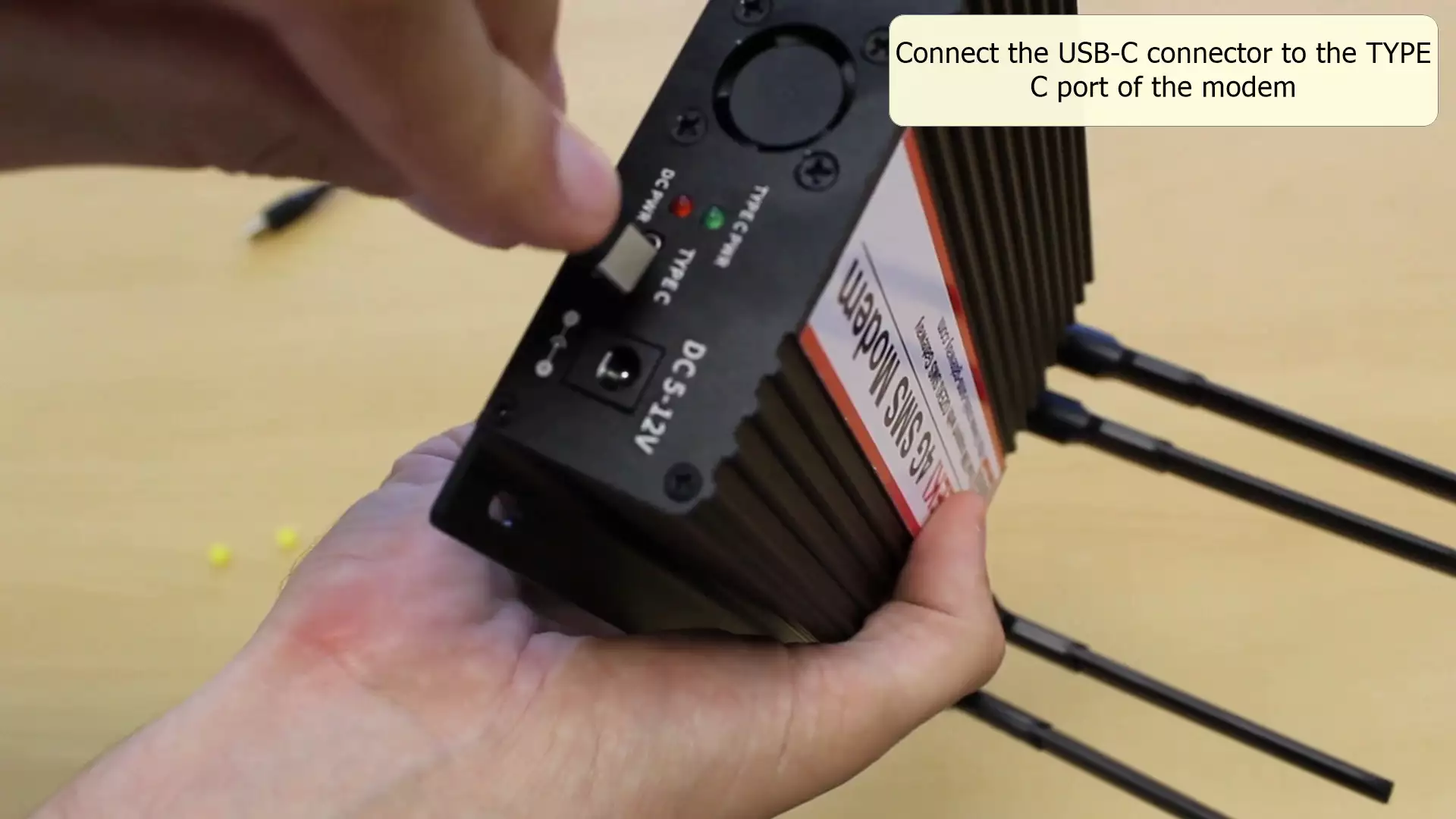 usb type c connector connected to the port labeled type c on the modem